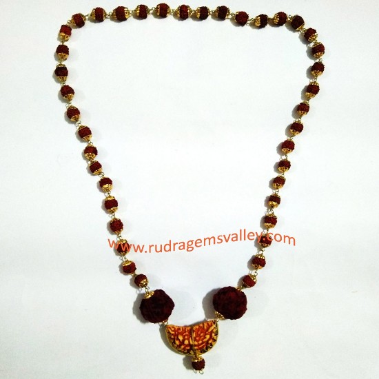 Picture of Rudraksha 5 face beads mala with gold plated metal caps, natural 5 face 7mm Indonesian 41 beads, natural 5 face 18mm Nepali 2 beads and artificial 1 face rudraksha in middle.