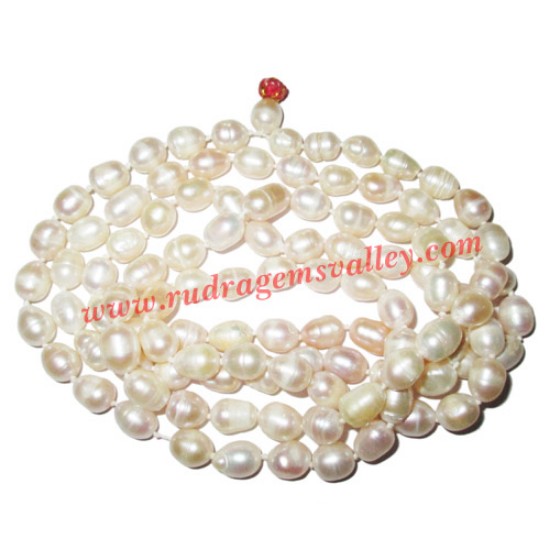 Picture of Fresh water pearl prayer mala of 7x9mm 108+1 beautiful pearls; weight approx 72.3. It represents moon and cures depression, insanity, mind, heart, eyesight, menstrual related problems etc.