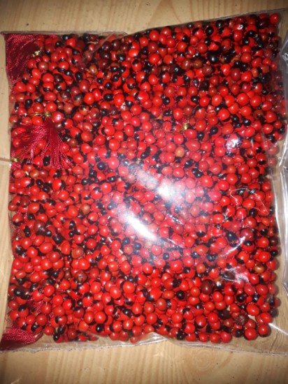 Picture of Gunja 108+1 beads knotted mala, also known as chirmi beads mala, rakta gunja mala. Pack of 1 mala