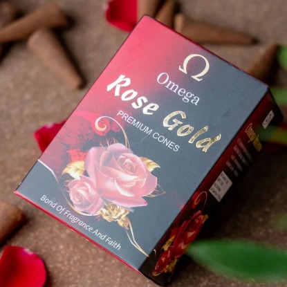 Picture of Omega Rose Gold Premium Incense Cones are made from a blend of natural ingredients, including aromatic herbs, resins, and essential oils. Cone size 2 inches, burning time 30 minutes, weight approx 100 grams.