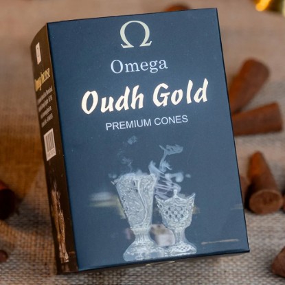 Picture of Omega Oudh Gold Premium Incense Cones are made from a blend of natural ingredients, including aromatic herbs, resins, and essential oils. Cone size 2 inches, burning time 30 minutes, weight approx 100 grams.