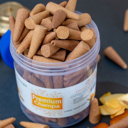 Picture of Omega Premium Champa Incense Cones in Jar, are made with natural champa flower also scientifically known as Michelia champaca, that release a natural pleasant fragrance, making them perfect for creating a relaxing and peaceful environment. Cone size 1.5 inches, burning time 20 minutes, weight approx 225 grams.