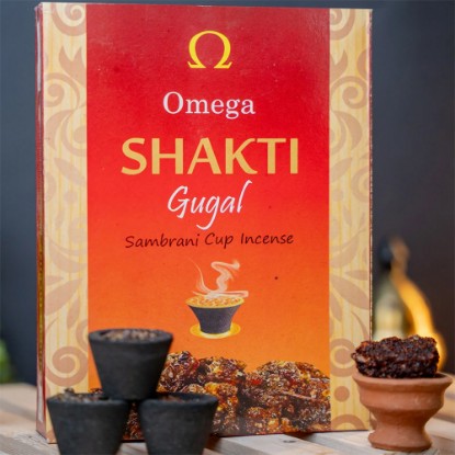Picture of Omega Shakti Gugal-Guggal Cup Sambrani made from a mixture of natural herbs, and resins to purify the air, reduce stress, and promote a sense of peace and tranquility. Burning time 20-25 minutes, Pack of 12 pcs.