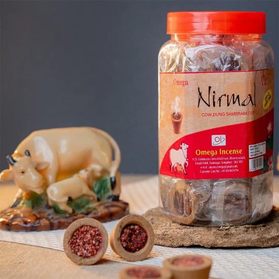Picture of Omega Shakti Nirmal Cow Dung Cup Sambrani in Jar made from pure cow dung, this traditional incense promotes a serene atmosphere while reducing air pollution by up to 94 percent. Burning time 20-25 minutes, Pack of 28 pcs.