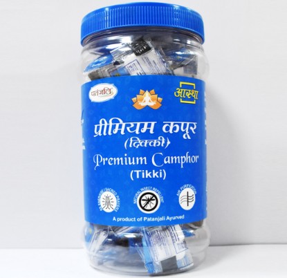 Picture of Patanjali Aastha Premium Camphor Tikki in Jar, Derived from the wood of the camphor tree, it is known for its distinct aroma and medicinal properties. Pack of 375 gram.